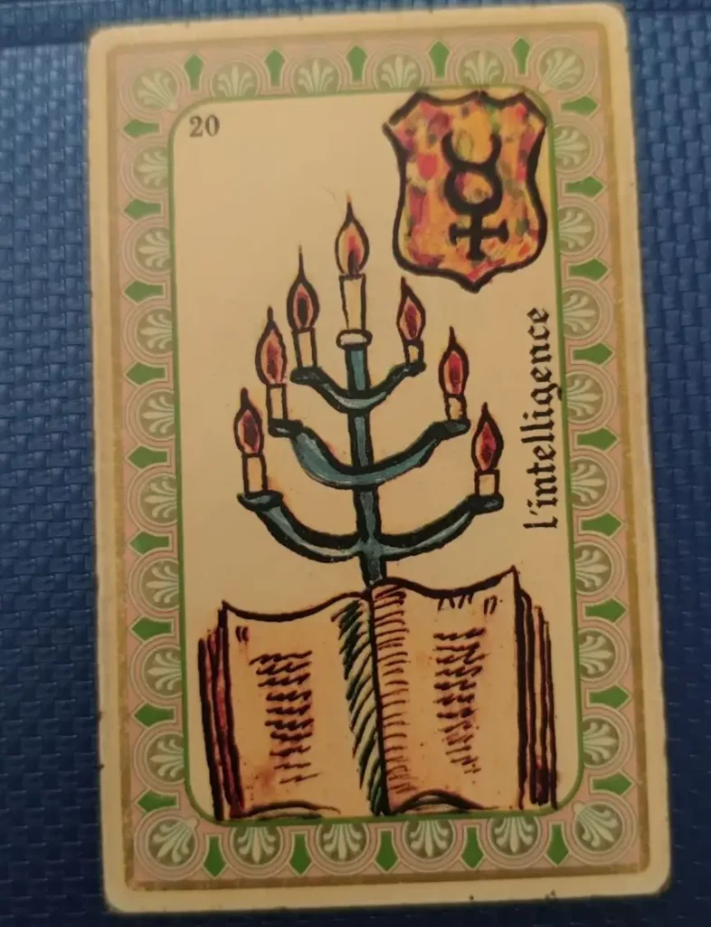 oracle Belline carte Intelligence 20 représentant un chandelier et un livre ouvert